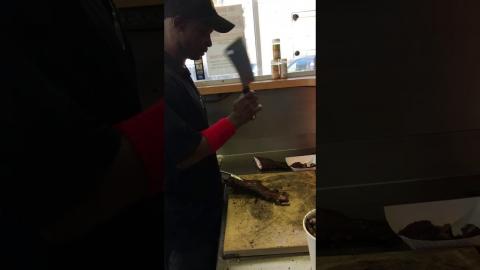 Chopping rib tips at Lem's In Chicago