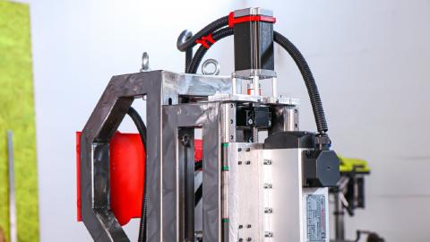 A CNC THAT MILLS ITS OWN PARTS FROM SCRATCH