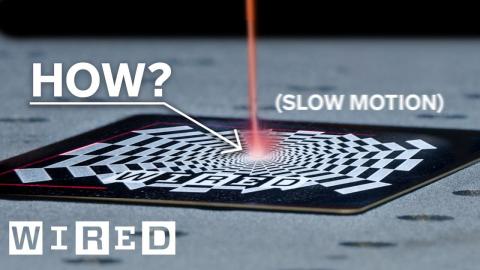 How Do Laser Beams Engrave Things? (slow motion) | WIRED